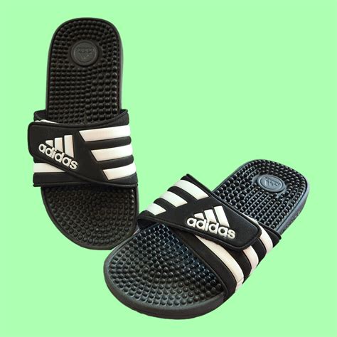 adidas Men's Adissage Slides Sandal, Black/White/Black, 6